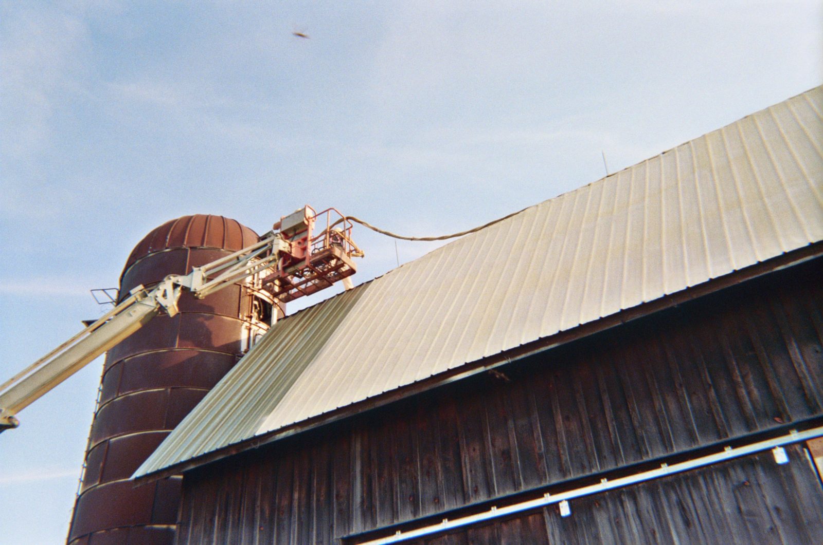 Foam roofing applied over a building deck